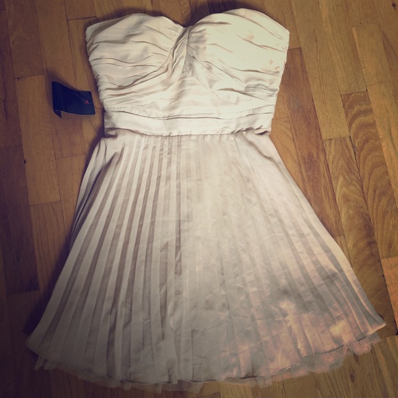 bebe Dresses & Skirts - NWT Bebe Cream Corsican Nights Pleated Mini Dress